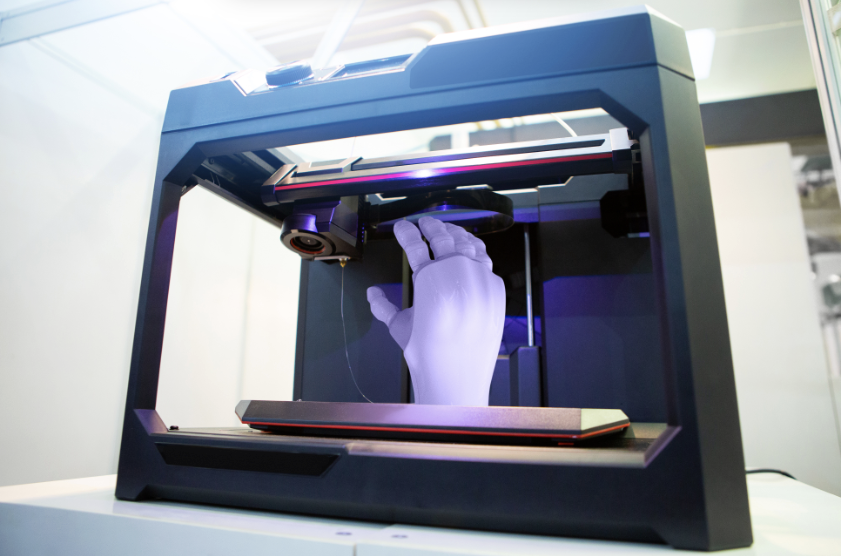 3D printer creating a hand model
